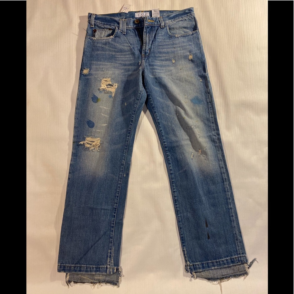 Armani Exchange distressed, whiskered jeans.